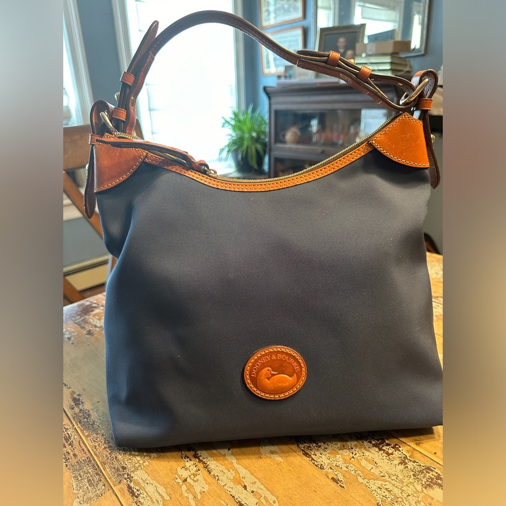 Dooney and Bourke blue canvas, large Erica bag. NEVER USED EUC!!Classic bag!!